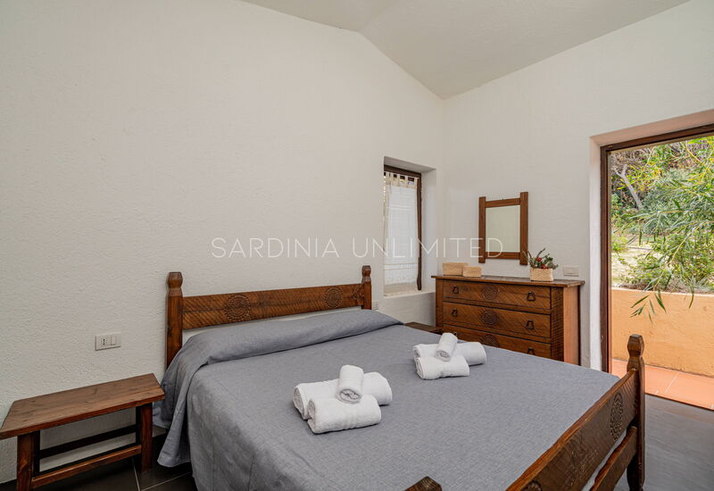 Villa Baia Di Myrtama: chambre à coucher